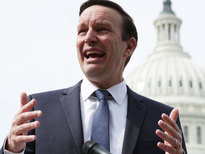Immigration - WASHINGTON, DC - APRIL 30: U.S. Sen. Chris Murphy (D-CT) (L) speaks as Sen.